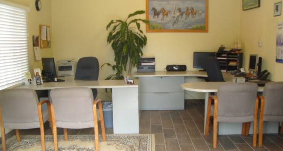 Liberty One Insurance Services office desks where agents work with clients
